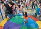 Evento 'Rua da Alegria' reúne centenas de crianças com brincadeiras e guloseimas em Sinop